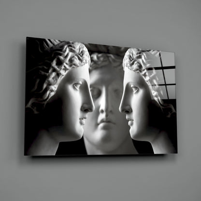 Black and White Mirrored Statue Faces Glass Wall Art