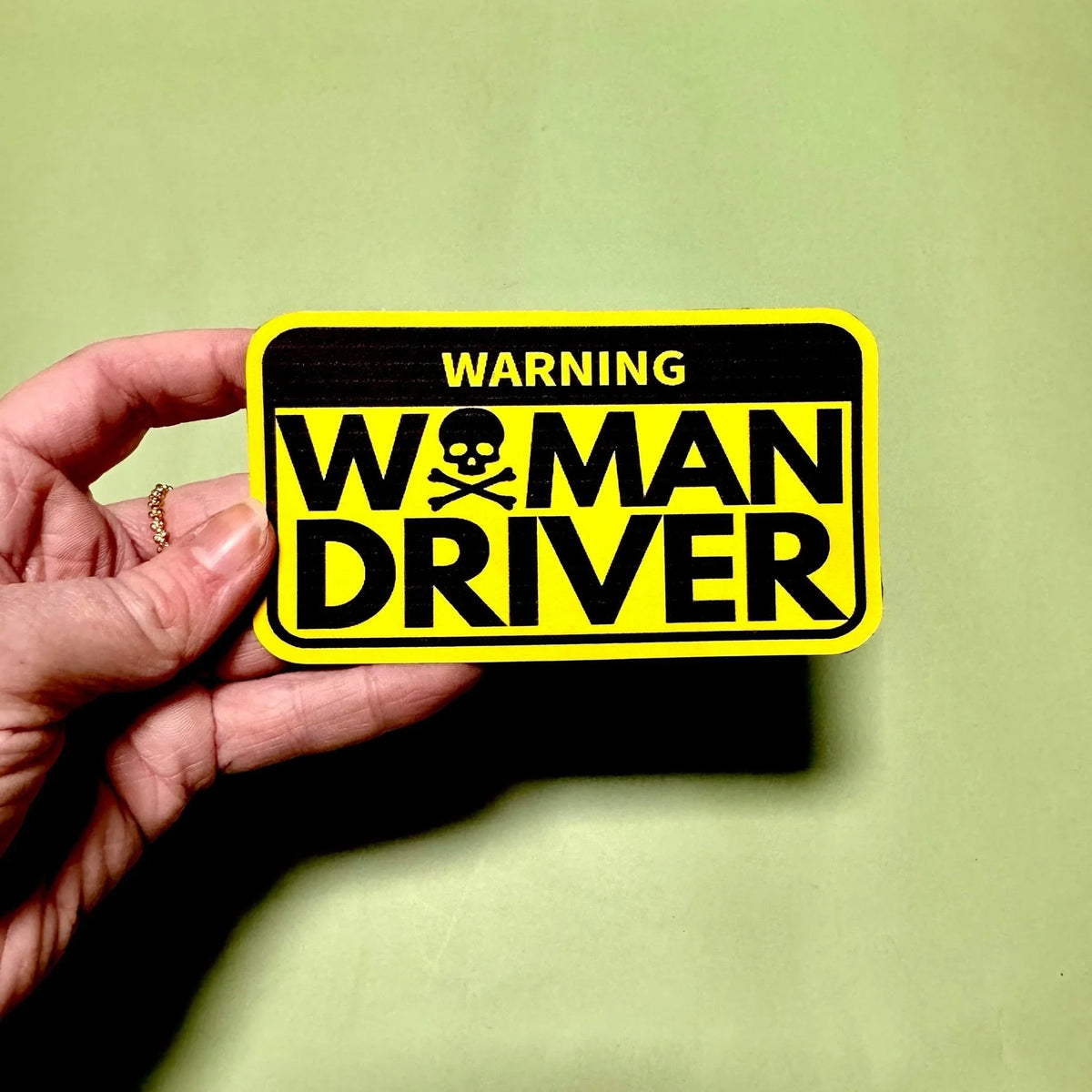 Warning: Woman Driver