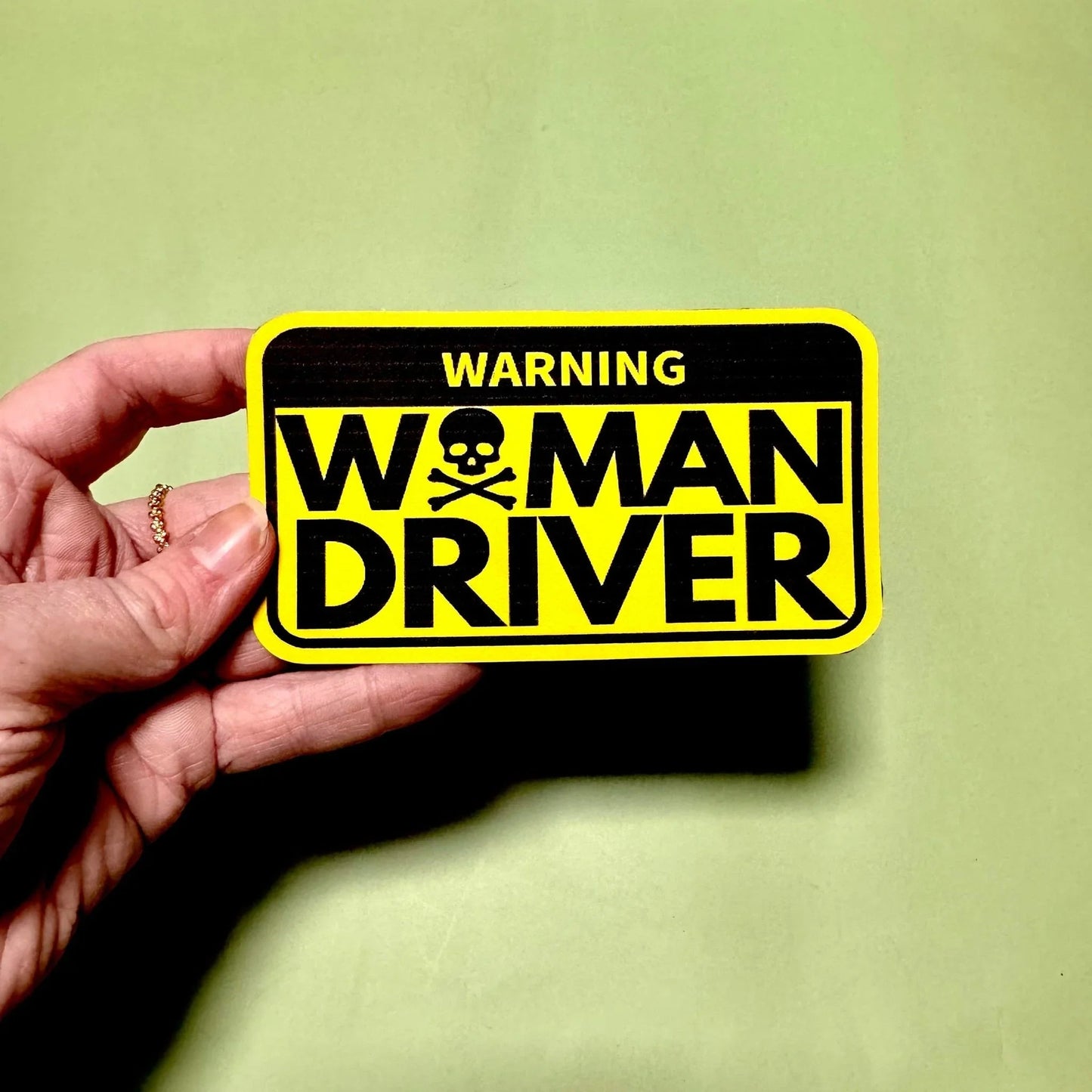Warning: Woman Driver