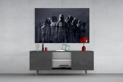 Hooded Figures in Shadow Glass Wall Art